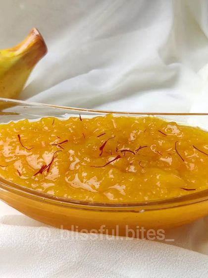 A beautiful shot of my Aam ka Murabba, with a fresh mango in the background to highlight the main ingredient.