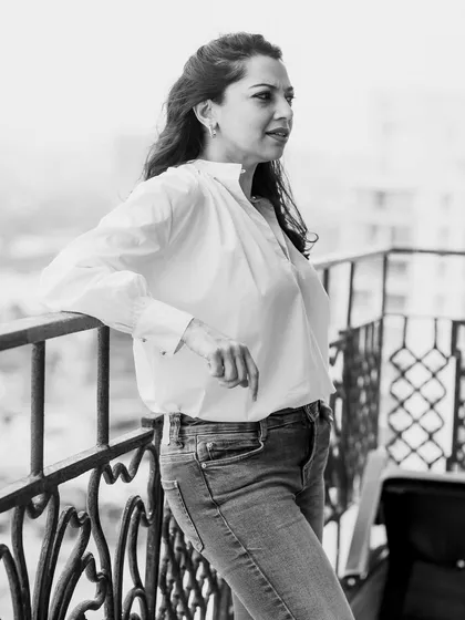 This is a black and white version of my own portrait, taken in a natural, outdoor setting. A great personal branding photo should feel authentic, and this image captures a more contemplative and professional side of my personality.