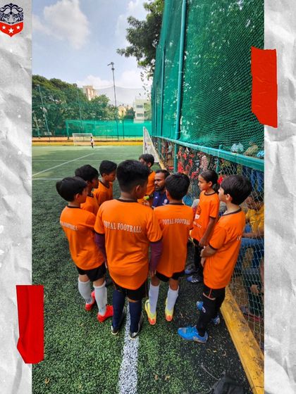 A team talk with our youngest players. The coach gathers the team in a huddle to give instructions and encouragement.