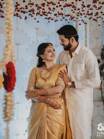 A collection of moments from bride Ishwarya's Muhurtham. Her golden wedding saree was draped to be both photogenic and practical for the various ceremonies of a traditional South Indian wedding.