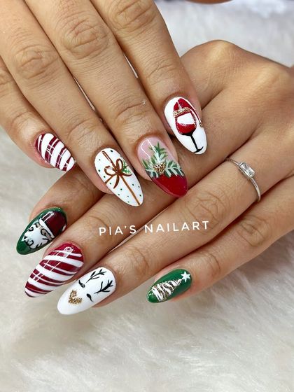 We wish you a merry Christmas with this detailed, hand-painted set featuring reindeer, presents, wine, and candy cane stripes.