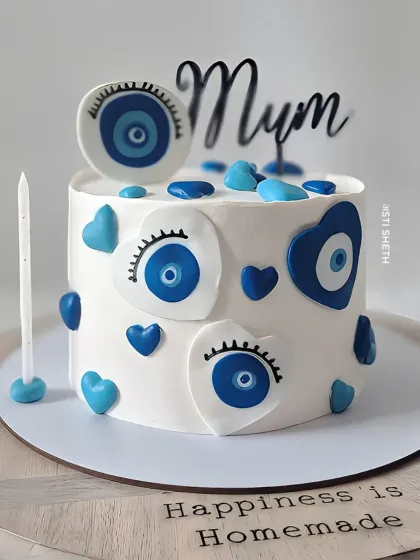 An evil eye-themed cake for "Mum," offering protection and love in the form of a delicious whipped cream cake.