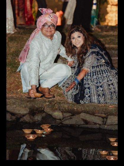 Guests participating in the candle floating ceremony. Creating these moments of shared experience and symbolism is what makes a wedding truly meaningful and memorable for everyone involved.