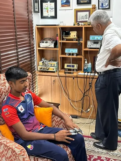 We merge tradition with technology. Here, one of our promising trainees undergoes a scientific performance assessment at the SUMONA Institute, measuring key metrics like heart rate and stress response to build mental and physical resilience.