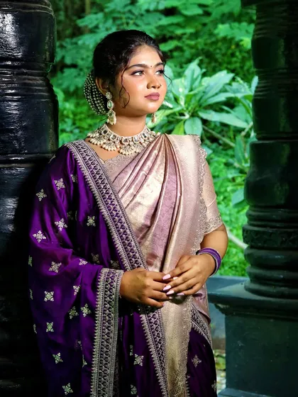 A modern bride with a touch of tradition. I balanced a contemporary soft glam makeup style with this gorgeous purple and gold saree, creating a look that is both timeless and fresh. The focus is on radiant skin and letting her natural beauty shine.