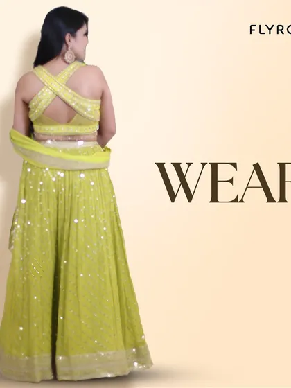 WEAR it with confidence. The stylish cross-back design of this lime green lehenga is sure to get you noticed.