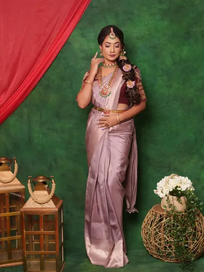 A full view shows how the right jewelry brings the entire outfit together. This rental set, with its choker, long necklace, and waist belt, creates a cohesive and absolutely stunning silhouette for any grand occasion.