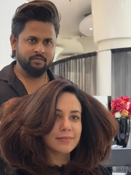 A fresh look means fresh energy. This client is rocking her new brown hair color, which has been styled with lots of volume and movement.