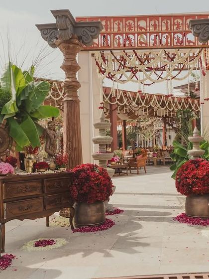 The entrance to our 'Artisan's Studio' themed Mehendi. We wanted the space to unfold gradually, with rustic decor and layered textiles for guests to discover.