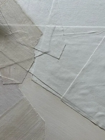 A close-up of a textured white-on-white abstract piece in progress. I love exploring the subtle interplay of texture, shadow, and form.