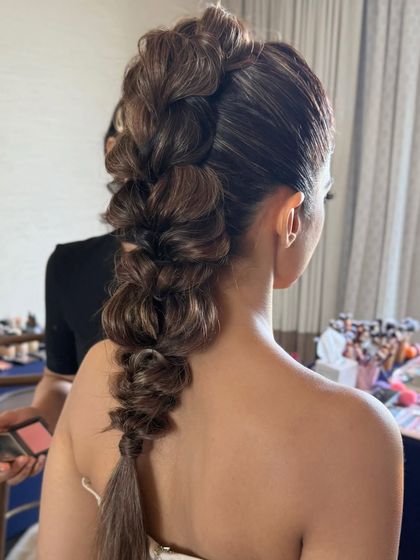 A behind-the-scenes look at the final touches being applied to this complex and beautiful braid.