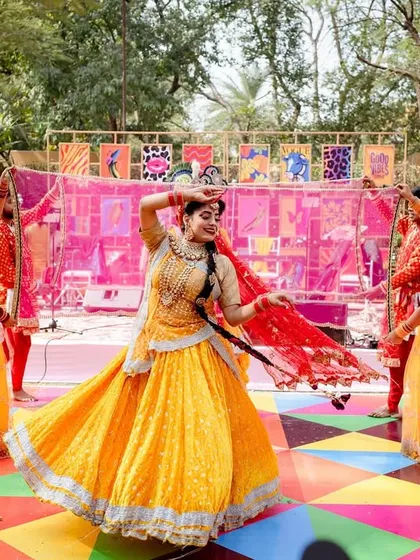 A colourful geometric dance floor for an outdoor Mehendi, with a backdrop of pop-art panels. We love creating decor that is fun and interactive.