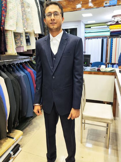 A collection of our clients in their custom-tailored formal suits, showcasing different fabrics and fits for various professional and formal occasions.