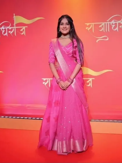 A full-length view of the pink lehenga-style saree drape, perfect for a red carpet event. This style is surprisingly easy to create once you learn the right technique.
