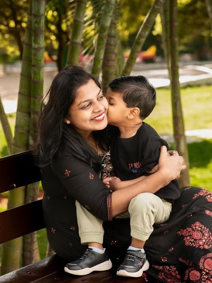 A sweet kiss from a son to his mother. These spontaneous displays of affection are the moments I strive to capture in every family session.