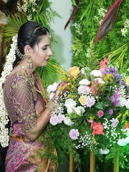 A picture-perfect family celebrating their housewarming. I had the pleasure of dressing my client Archana in a hand-worked blouse, her husband in a custom shirt, and their son in a charming Kalamkari kurta.