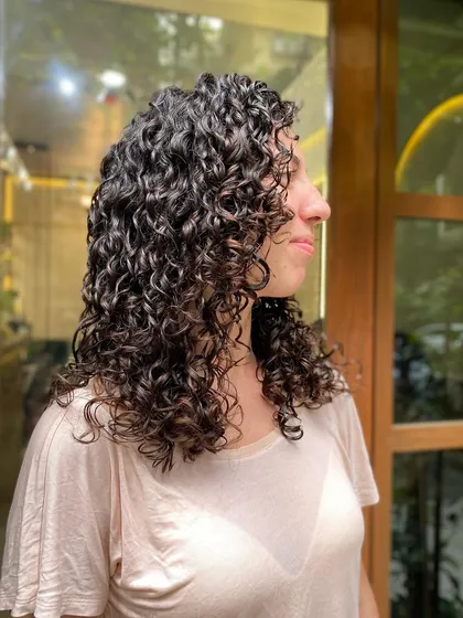 A gallery of my wonderful clients flaunting their unique and beautiful curls. Every curl pattern is different, and I love celebrating them all.