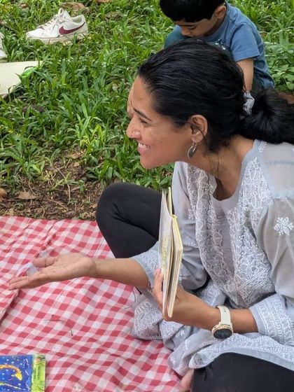 Close-ups of me interacting with the children, asking questions and encouraging them to share their thoughts on the story.