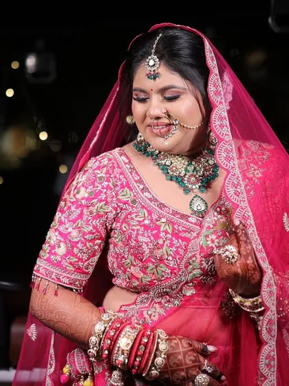 My beautiful bride Avani in a stunning pink lehenga. Her makeup was designed to be fresh and glowing, perfect for her destination wedding.
