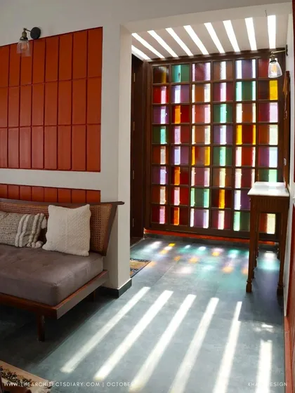 Color and light can create magic. For the Raghunath Farmhouse in Kotagiri, I designed this entryway screen using colored glass panes. As sunlight streams through, it casts a vibrant, shifting mosaic on the floor, turning the simple act of entering the home into a joyful and artistic moment.