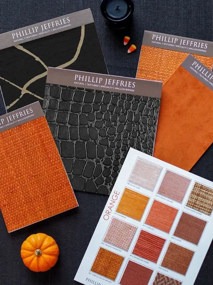 We love curating palettes for every occasion, even Halloween. This flat lay for Phillip Jeffries showcases a range of textures, from bold orange weaves to faux crocodile leather, demonstrating the versatility and creativity of our collections.