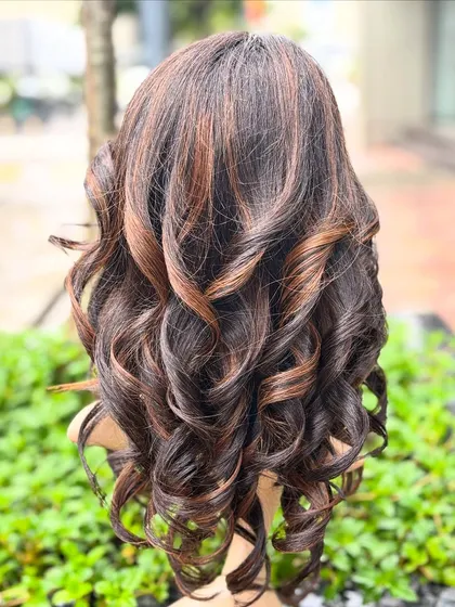 This molten honey colored wig is one of our most glamorous custom pieces. It's perfect for everyday wear and is made with high-quality Remy hair.