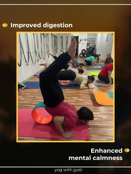 Another student explores Locust Pose with a yoga wheel, which helps improve digestion and enhance mental calmness by making the pose more sustainable.