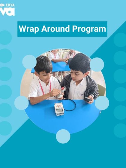 In my Wrap Around Program, students get to dive deep into their interests, like robotics. Here, two boys collaborate on a project, learning about electronics and mechanics in a supportive, hands-on environment.