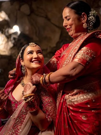 A heartwarming moment between the bride and her mother during the getting-ready process.