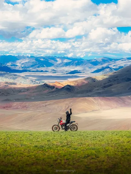A throwback to the Himalayan Odyssey with Royal Enfield. This shot of me on my bike against the classic Ladakh backdrop of multi-colored mountains and a bright blue sky is the epitome of a bike adventure.