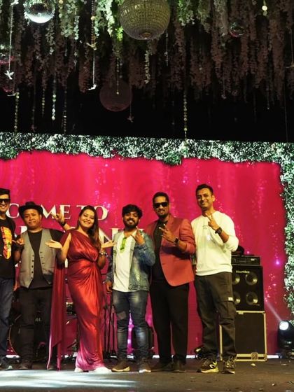 Posing together after rocking a Sangeet night. The energy was incredible, and we had as much fun on stage as the guests had on the dance floor. That's what a successful celebration is all about.