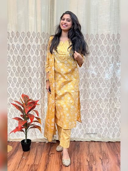 This yellow printed suit set is another beautiful option from my festive collection. The bright, happy color is perfect for celebrations.