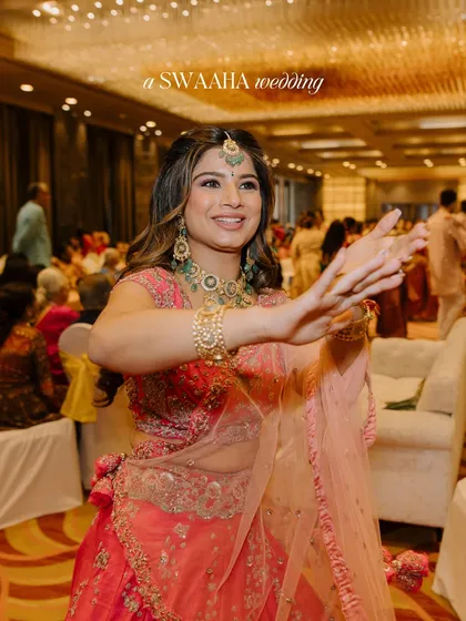 A guest joyfully dancing during the traditional ceremonies.