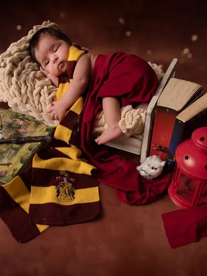 For the parents who love a little bit of magic, I adore creating themed sessions like this Harry Potter setup. It’s a wonderfully fun way to celebrate your little one’s arrival and your family's passions.
