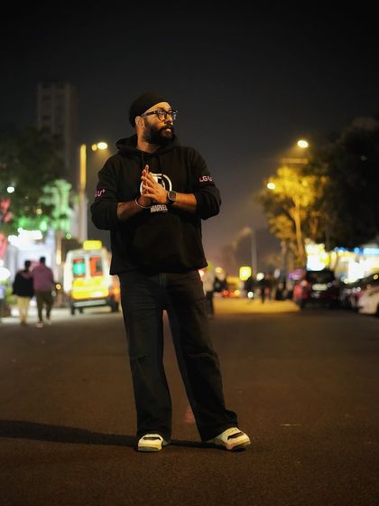 Another self portrait, this time with a more thoughtful pose. I love playing with the light and shadows of the city at night to create these kinds of expressive images.