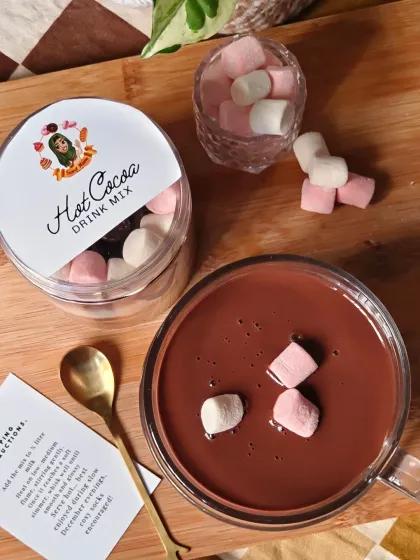 An overhead shot of my finished hot chocolate, topped with melting marshmallows. This image captures the cozy, indulgent feeling that my hot cocoa mix is designed to provide.