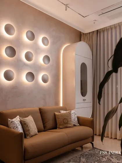 Lighting is jewelry for the home. This sculptural wall installation is a perfect example. During the day, it's a piece of art; at night, it casts a soft, ambient glow, transforming the entire mood of the room with quiet drama.