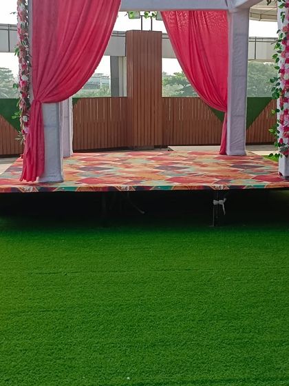 This is the attached lawn area at Ellora Banquet in Sanpada. It features a mandap setup, making it a great option for conducting wedding rituals in an open-air setting.
