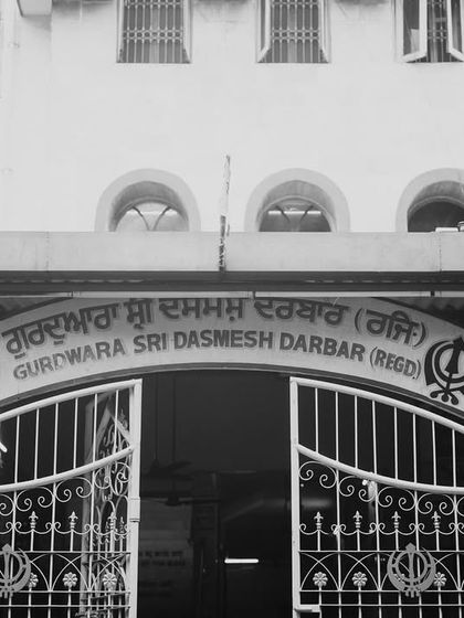 The entrance to the Gurdwara, setting the scene for a beautiful Sikh wedding. Capturing the location is key to telling the full story.