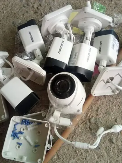 A collection of new Hikvision cameras and mounting boxes ready for a project. I always come prepared with all the necessary high-quality components for a clean and secure installation.
