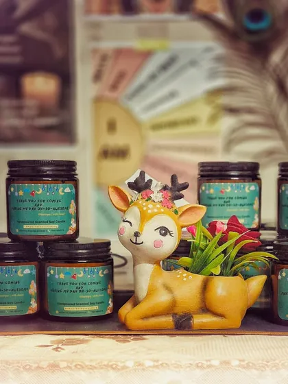 Another shot of my custom-labeled birthday return-gift candles, displayed with a cute deer planter. Personalization is at the heart of what I do, and I love creating these special touches.