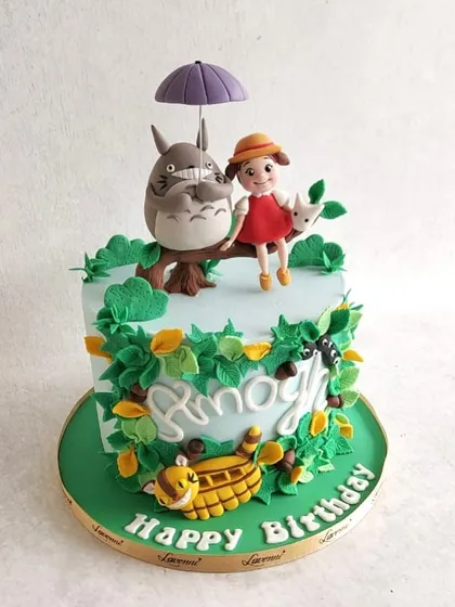 A whimsical "My Neighbor Totoro" cake for Amogh's birthday, with detailed figurines of Totoro and Mei.