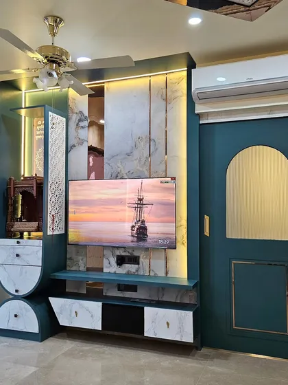 Who says a TV unit can’t be a statement piece? This unique design combines a TV unit with an integrated temple, all in a bold teal and marble finish.
