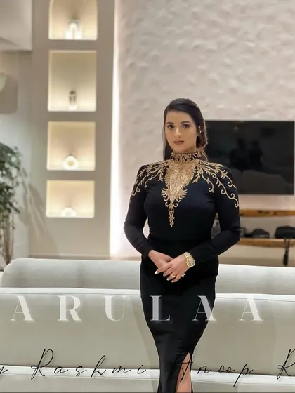 The full view of the black birthday gown. The design is all about making a bold and confident statement.