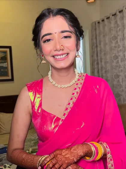 Another shot of this lovely Haldi look. The focus is on enhancing her natural glow and making her feel comfortable and beautiful.