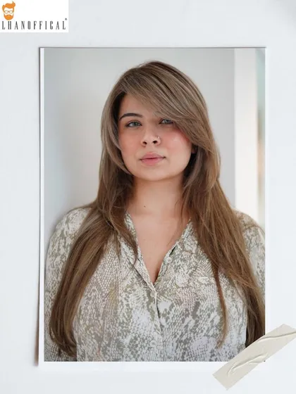 A full-face view of the ice blonde look, showing how the cool tones complement the client's features.