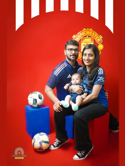 When a family's passion becomes the theme of the photoshoot. We loved creating this custom Manchester United setup for a family of hardcore football fans to welcome their newest team member.