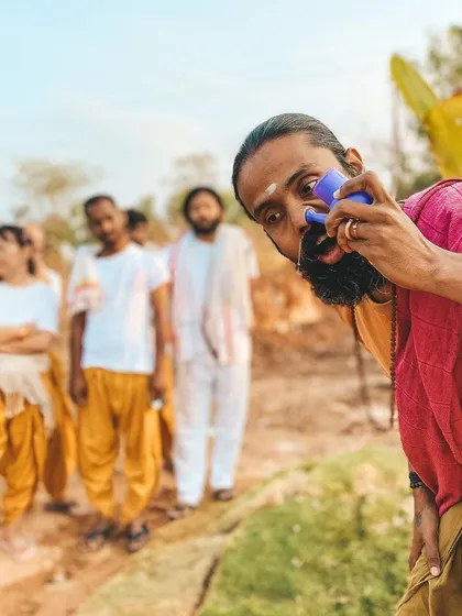 I demonstrate the practice of Jala Neti. This traditional cleansing technique is part of the holistic yogic lifestyle we teach at the ashram.