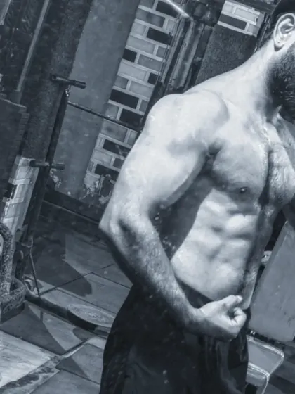 Just have patience. This black and white shot highlights the cuts and definition that come from a lean physique.