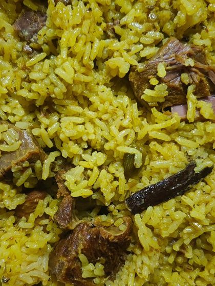 A comforting bowl of Aalni Mutton Pulao, made with fragrant Indrayani rice. This dish is like a warm hug in a bowl, full of subtle flavours and tender mutton.
